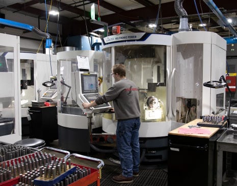 Employee Regrinding Carbide Tools on Walter Machine